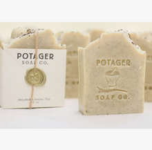 Load image into Gallery viewer, Potager Soap Co. handmade soap in the Minted Lemon Tea scent. Two bars are shown, one with a label, one without. The label is held onto soap with a piece of twine and a melted wax seal. The bar without the label has the brand name and logo carved into the soap.