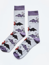 Load image into Gallery viewer, Light blue socks with light purple cuffs, heels and toes. Alternating rows of purple/blue and red/black bats line the socks. The name Bare Kind is written in grey under the first row of bats. 