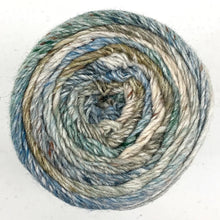 Load image into Gallery viewer, Close up of Noro yarn in color Hamura; Strands in shades of blue, green, and brown spiral in circle on white background