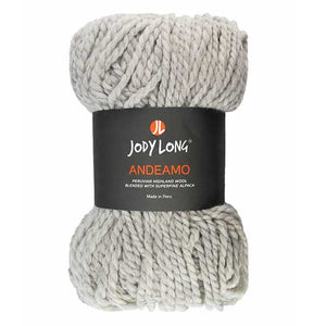 Bundle of light gray yarn on a white background. Thick strands of yarn held together in middle by black label that reads "JODY LONG ANDEAMO" in white and orange lettering
