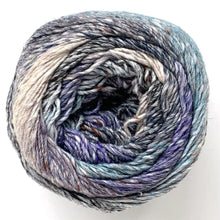 Load image into Gallery viewer, Close up of top of Noro yarn in color Hirosaki; Strands in shades of blue, purple, black, and tan spiral in circle on white background