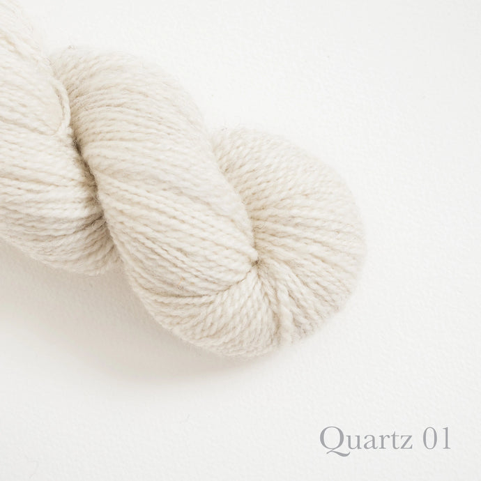American Romney + Merino Yarn Stone Wool in color Quartz 01. Strands in off white
