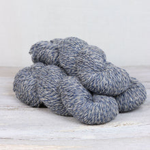 Load image into Gallery viewer, 3 skeins of white and blue yarn on white background.