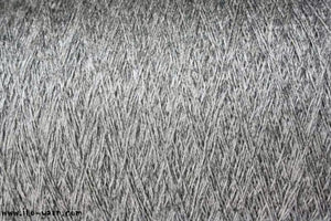 Close up image of light gray/silver yarn strands