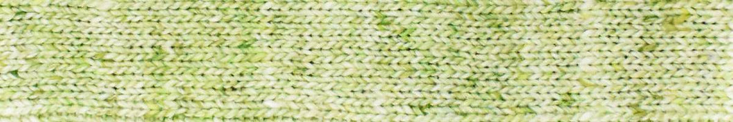 Close up of knitted stitches with Noro Yarn in Moegi shade; Mostly light green color