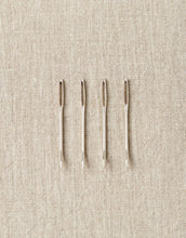 Load image into Gallery viewer, Image of four bent tip tapestry needles laid out on tan colored cloth backgound