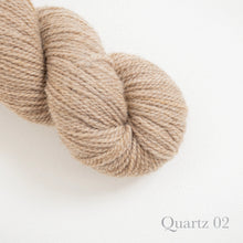 Load image into Gallery viewer, American Romney + Merino Yarn Stone Wool in color Quartz 02. Strands in shades of light tan