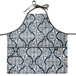 Apron covered in white and blue symmetrical pattern on white background