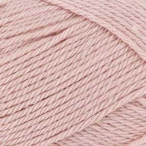 Close up of light pink strands of yarn