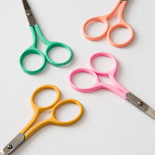 Load image into Gallery viewer, Four pairs of small scissors in mustard yellow, light peach, bright pink, and mint green displayed on white background
