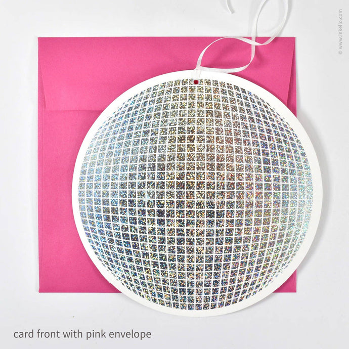Decorative card front with rhinestone pattern on a pink envelope