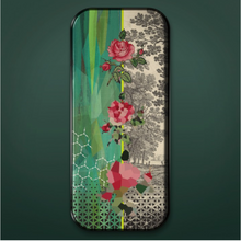 Load image into Gallery viewer, Long colorful tray on green background. Images of flowers and trees on tray in shades of pink, green, yellow, blue, and gray