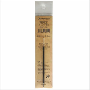 Ball point pen refill cartridge in a clear plastic package with a tan paper lining the package with product information