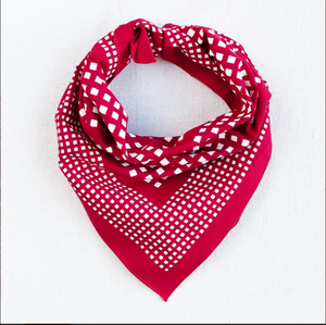 Bright red bandana with white square designs