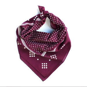 Maroon bandana with white polka dots and stripes