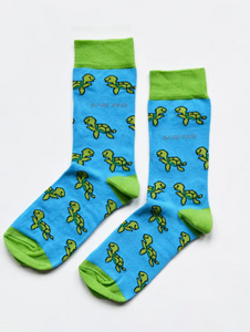 Aqua blue socks with lime green cuffs, heels and toes. Lime green turtles line the socks. The name Bare Kind is written in grey under the first row of turtles. 