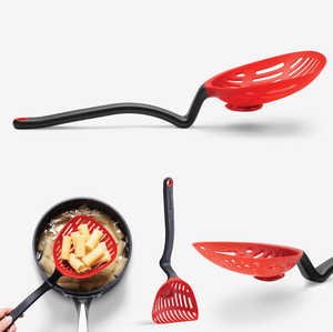 Large slotted spoon with red strainer on end of black handle. Handle had indent to hold spoon up from table. Shows strainer lifting cooked noodles from large pot