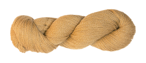 Light yellow skein of yarn on black and gray checkered background