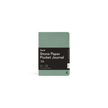 Load image into Gallery viewer, Small light green journal on white background with black paper wrap covering middle section; Black wrap reads &quot;KARST&quot; &quot;Stone Paper Pocket Journal&quot; &quot;A6&quot; in white on right side; Small black &quot;K&quot; stamped in bottom right corner of cover