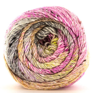 Close up of top of Noro yarn in color Wakayama; Strands in shades of pink, yellow, brown, black, and purple spiral in circle on white background