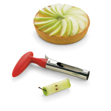 Load image into Gallery viewer, Small pie with green apple slices spiraled out on top, red and stainless steel apple corer, and small green apple core lay on white background
