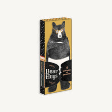 Load image into Gallery viewer, Yellow and black box of Bear Hugs notecards and envelopes with drawing of black bear wrapped in white towel with yellow glasses on sits on front of box