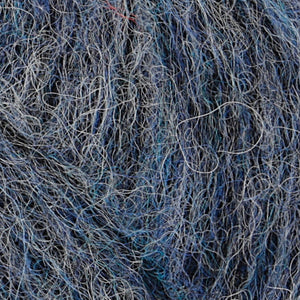 Close up of Rowan Alpaca Classic color 105. Strands in shades of light blue, dark blue, and white