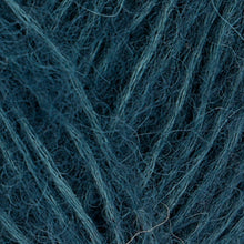 Load image into Gallery viewer, Close up of Rowan Alpaca Classic yarn in color 109. Strands in shades of light and dark blue