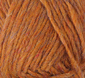 Close up of color 9971. Strands in shades of orange, yellow, pink, and blue