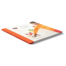 Load image into Gallery viewer, Image of book from the side resting on white background. Orange spine and boy in orange shirt on either side of cover. Butterflies on boy&#39;s extended arm fill middle of cover white top reads &quot;all that I Am&quot; in silver