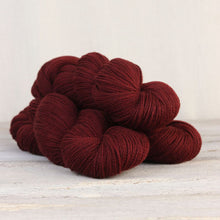 Load image into Gallery viewer, The Fibre Co. Amble yarn in color Appleby Castle. Strands in shades of red