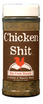 Brown bottle label, white lettering, white cap and red chicken logo. Seasoning name; "Chicken shit"