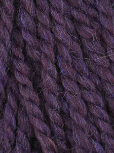 Close up of Jody Long Andeamo yarn in color 019. Strands in shades of blue and purple