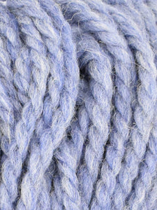 Close up of Jody Long Andeamo yarn iin color 022. Strands in shades of light blue and white