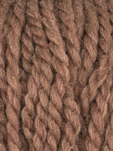 Close up of Jody Long Andeamo yarn in color 023. Strands in shades of light and dark brown