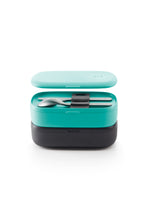 Load image into Gallery viewer, Knife and spoon in an open, teal to-go box sitting on top of a closed black to-go box.