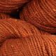 Load image into Gallery viewer, Close up image of Orange Storm colored yarn hank; bright dark orange hue with yellow speckled throughout