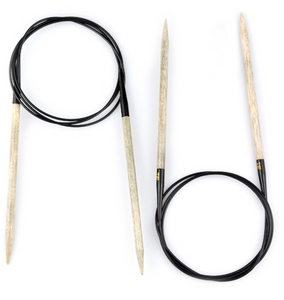 2 pairs of 40" circular knitting needles made of light gray birch wood with black connector and black cables pictured on white background