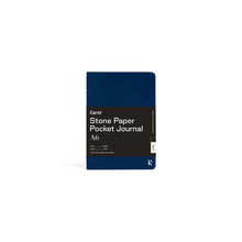 Load image into Gallery viewer, Small dark blue journal on white background with black paper wrap covering middle section; Black wrap reads &quot;KARST&quot; &quot;Stone Paper Pocket Journal&quot; &quot;A6&quot; in white on right side; Small white &quot;K&quot; stamped in bottom right corner of cover