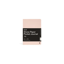 Load image into Gallery viewer, Small light pink journal on white background with black paper wrap covering middle section; Black wrap reads &quot;KARST&quot; &quot;Stone Paper Pocket Journal&quot; &quot;A6&quot; in white on right side; Small black &quot;K&quot; stamped in bottom right corner of cover