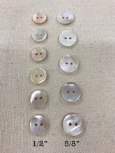 Load image into Gallery viewer, Image of two sets of round mother of pearl buttons on tan background. One set measures 1/2&quot;, other measures 5/8&quot;