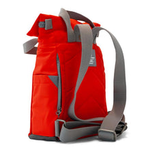 Load image into Gallery viewer, Side image of red ORI bag with gray back straps and a secret side zipper pocket on white background
